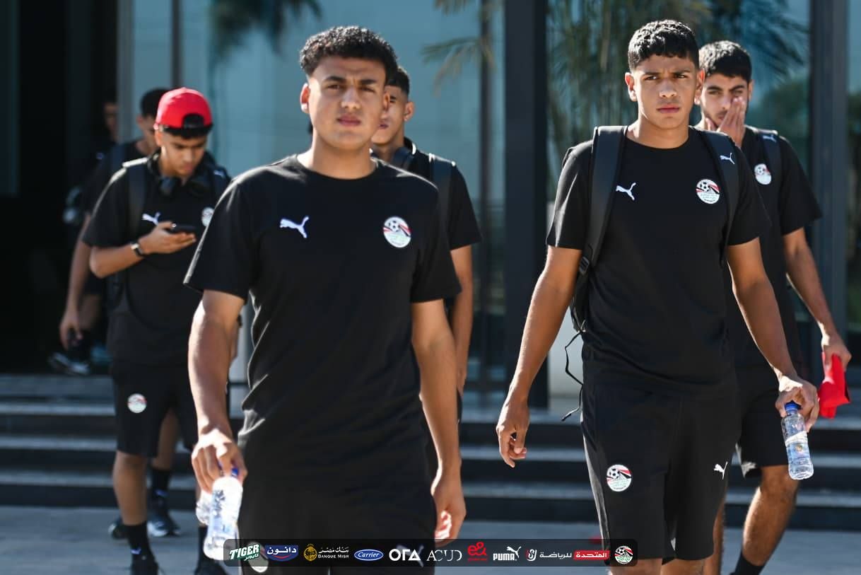 May be an image of soccer, football and text that says 'TIGER دانون 459E Carrier OrA OLAACUS ACUD PUMA. S للرياضة المتحدة ディア'