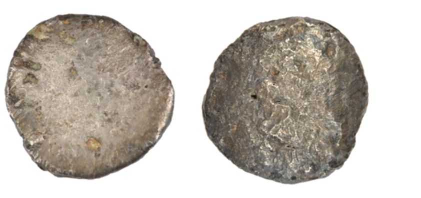 A close-up of a coin AI-generated content may be incorrect.