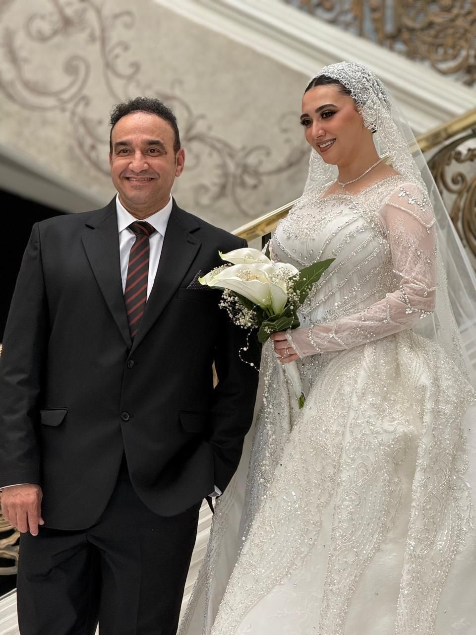 العروسة ووالدها توفيق السيد