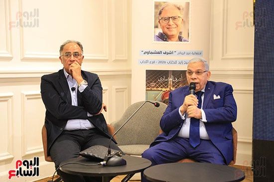 الناشر محمد رشاد والروائي اشرف العشماوي