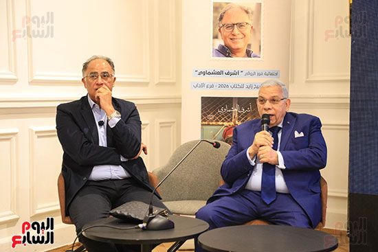 الناشر محمد رشاد والروائي اشرف العشماوي