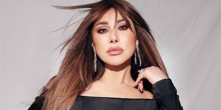 نجوى كرم تصالح أحد معجبيها بعد طرده من حفلها باستراليا