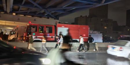 إخماد حريق سيارة ميكروباص أعلى الطريق الدائري بالبراجيل