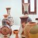 الرسم على الأوانى التراثية والمنزلية يجذب زوار ملتقى بدنة السياحي فى السعودية