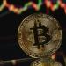 بيتكوين تتراجع مع تصاعد توقعات رفع الفائدة رغم الاتفاق الأمريكى الإيرانى
