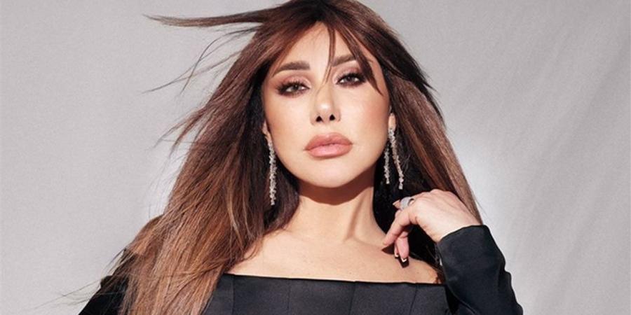 نجوى كرم تصالح أحد معجبيها بعد طرده من حفلها باستراليا