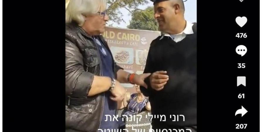 "الداخلية" تكشف حقيقة فيديو عرض أجنبى مبلغ مالى على أحد أفراد الشرطة مقابل إعطائه ملابسه