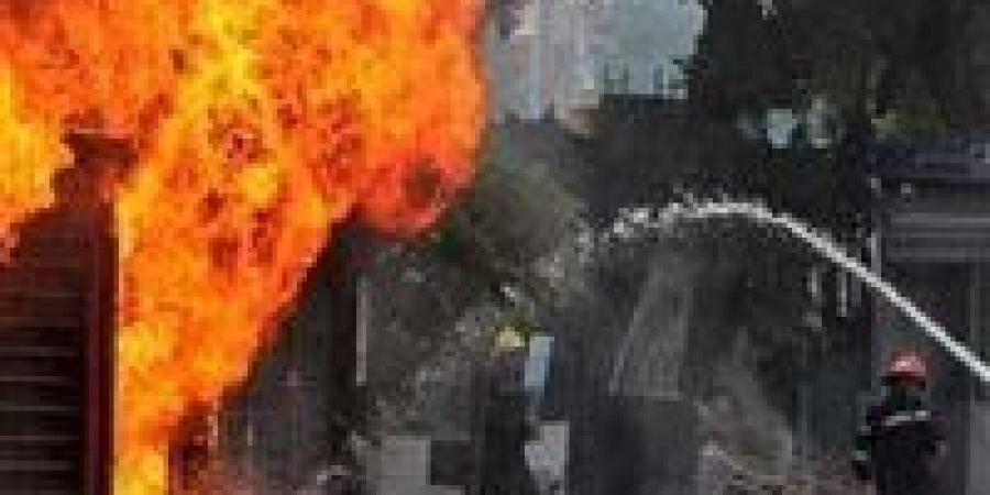 الحماية المدنية تسيطر على حريق محل ملابس بميدان الجيزة